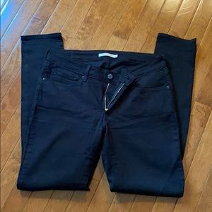 711 series black jeans Levi’s